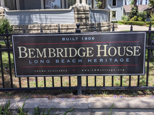 Sign for Bembridge House, built in 1906, with information about tours and Long Beach Heritage.