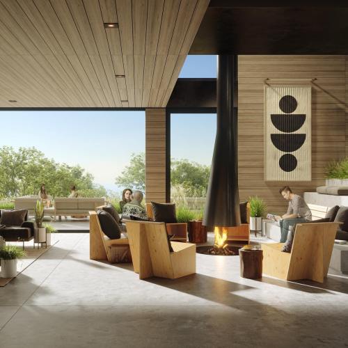 A modern indoor space with wooden accents, seating around a fire, and large windows showcasing greenery outside.