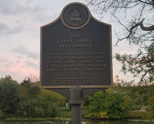Historical marker for Clark Dibble Settlement, established in 1834, detailing its significance and naming history.
