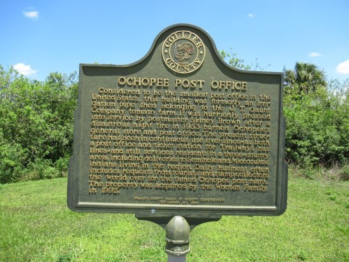 Historical marker for the Ochopee Post Office, detailing its significance and history in the U.S. postal system.