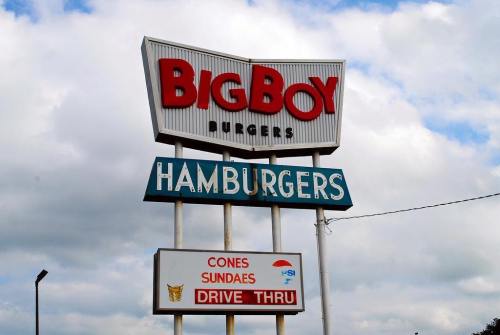 Sign for Big Boy Burgers featuring "Hamburgers" and advertising cones and sundaes with a drive-thru option.