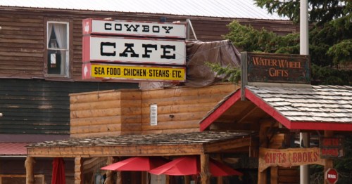 Exterior of Cowboy Cafe in Wyoming, showing historic wooden building