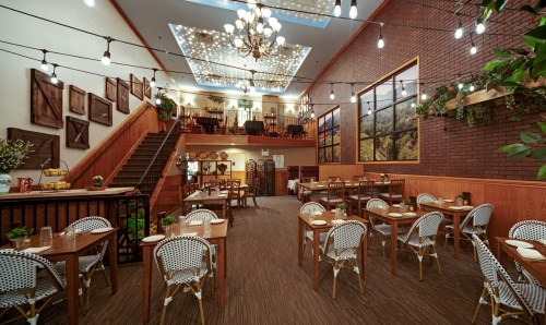 A cozy restaurant interior with wooden tables, chairs, and a staircase, adorned with string lights and artwork.