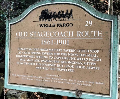 Sign about the Old Stagecoach Route (1861-1901) detailing travel stops and services for travelers.