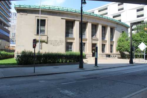 Exterior view of the Skillman Branch of the Detroit Public Library, featuring a classic architectural design and greenery.