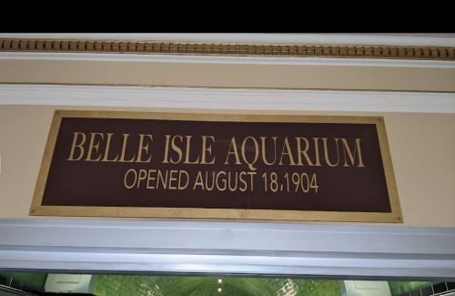 Sign for Belle Isle Aquarium, stating it opened on August 18, 1904.