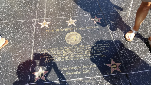 A plaque on the Hollywood Walk of Fame commemorating the first stars and a time capsule dedication from November 2010.