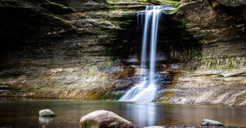 A stunning thin waterfall in Illinois on a summer hike