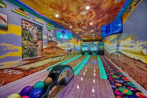 A vibrant bowling alley with colorful murals, glowing lanes, and screens displaying sports.