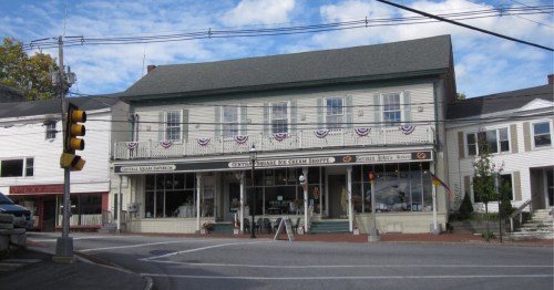 Historic downtown Hillsborough, New Hampshire under a blue sky.