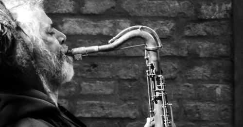 A man playing a saxaphone