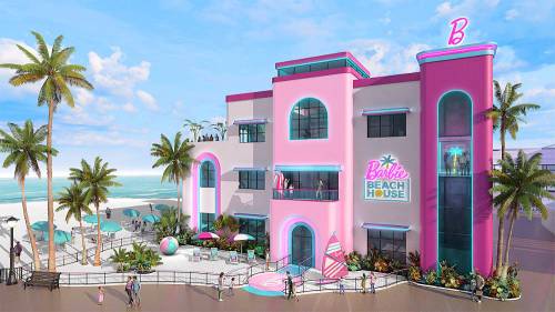 A colorful, modern beach house with pink accents, palm trees, and ocean views, featuring a large "Barbie Beach House" sign.