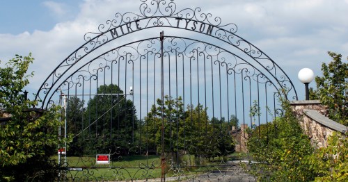 gate to the once-abandoned mike tyson mansion in ohio