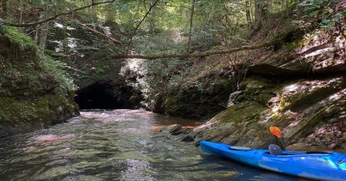 Blue kayak in the entrance of the Etowah Tunnel in Georgia