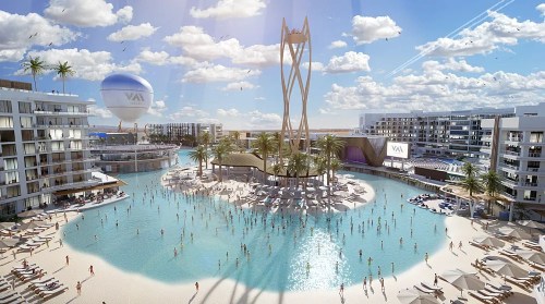 A vibrant resort with a large pool, palm trees, and people enjoying the sunny beach atmosphere under a blue sky.