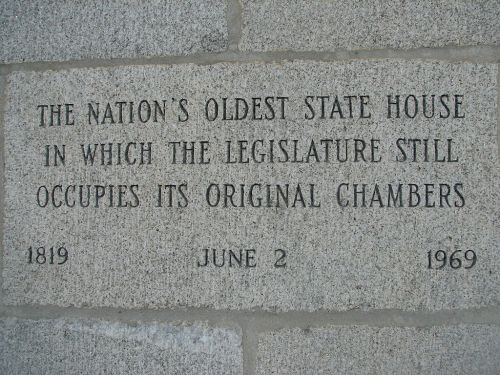 Plaque reading: "The nation's oldest state house in which the legislature still occupies its original chambers. 1819 June 2 1969."