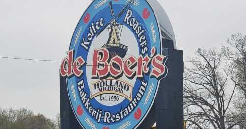 Sign for de Boer's Bakery-Restaurant in Holland, Michigan, featuring a ship graphic and established date of 1956.