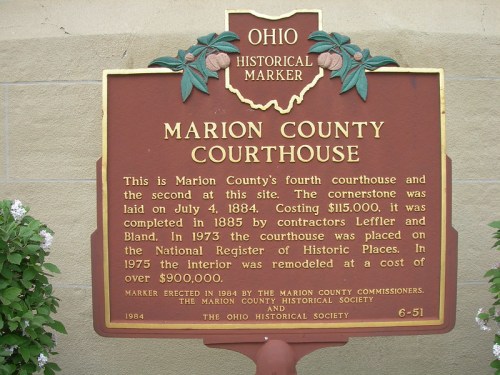 Historical marker for Marion County Courthouse, detailing its construction in 1884 and historical significance.