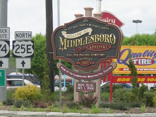 Welcome sign for Middlesboro, Kentucky, highlighting its historic downtown and the Cumberland Mountain Fall Festival.