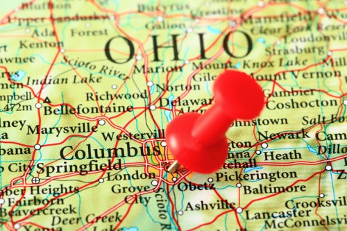 A close-up of a map of Ohio with a red pushpin marking Columbus.