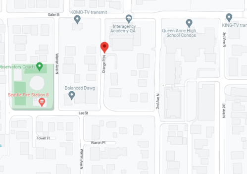 Map showing streets and buildings in a neighborhood, with a red marker indicating a specific location on Orange N.