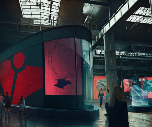 A modern exhibition space with large screens displaying colorful aquatic visuals and visitors exploring the area.