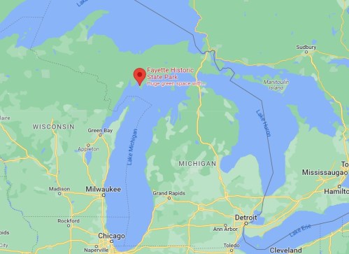Map showing Fayette Historic State Park in Michigan, highlighting a large green space near Lake Michigan.