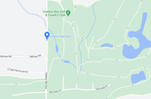 Map showing Useless Bay Golf & Country Club and surrounding roads, including Millman Rd and Discovery Pl.