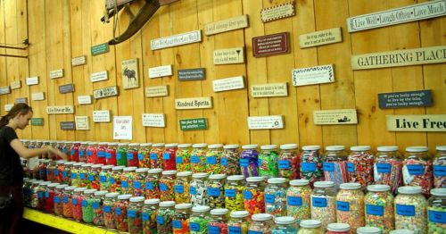 Chutters in Littleton, New Hampshire, with a wooden wall and huge display of colorful candies.