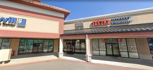 Exterior view of a shopping center featuring Great Harvest Bread Co. and Sakura Japanese Steakhouse.