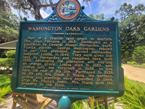 Historical marker about Washington Oaks Gardens, detailing its origins and development by the Young family in Florida.