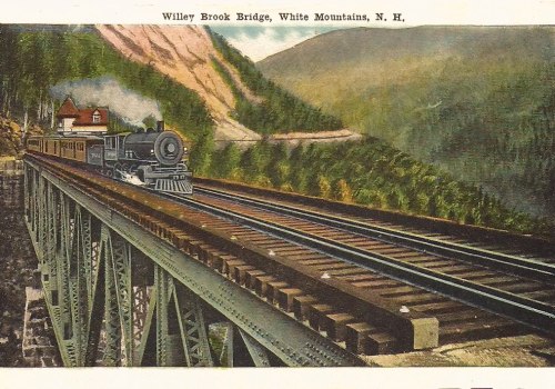 A vintage postcard depicting a steam locomotive crossing Willey Brook Bridge in the White Mountains, New Hampshire.
