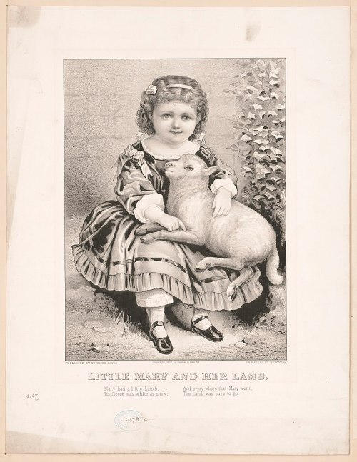 A young girl in a dress sits with a lamb, smiling gently, surrounded by a brick wall. Text reads "Little Mary and Her Lamb."