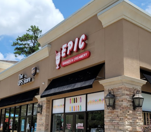 Exterior of a building featuring the sign for "Epic Shakes & Creamery" and a UPS Store nearby.