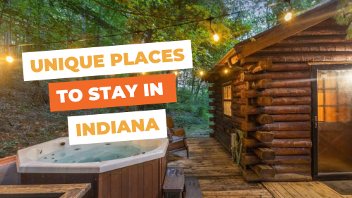 Cozy cabin in the woods with a hot tub, surrounded by trees, promoting unique stays in Indiana.