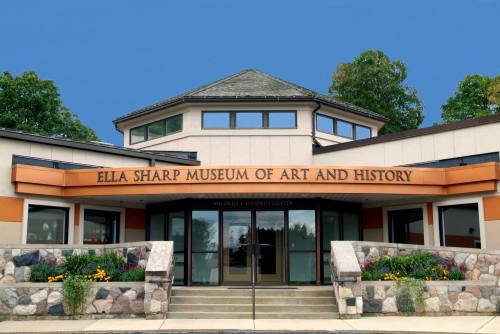 Exterior view of the Ella Sharp Museum of Art and History, featuring a modern design and landscaped entrance.