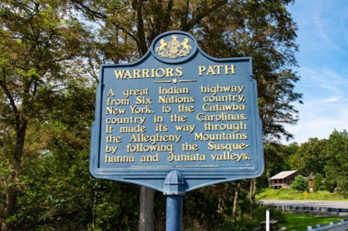 Historical marker titled "Warriors Path," describing an Indian highway from New York to the Carolinas through the Allegheny Mountains.