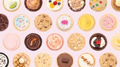 A colorful assortment of various cookies with different toppings and flavors arranged in a grid pattern.