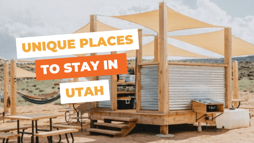 A modern outdoor cabin in Utah with a hammock, picnic table, and shade sails against a desert backdrop.