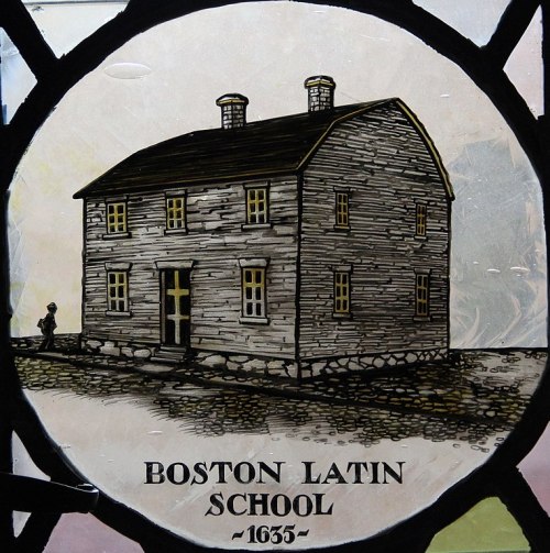 Illustration of Boston Latin School, a historic wooden building from 1635, framed by a circular design.