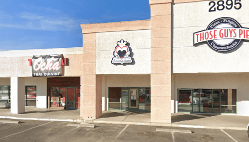 Exterior view of a shopping plaza featuring "Ocha Thai Cuisine" and "Those Guys Pies" storefronts.