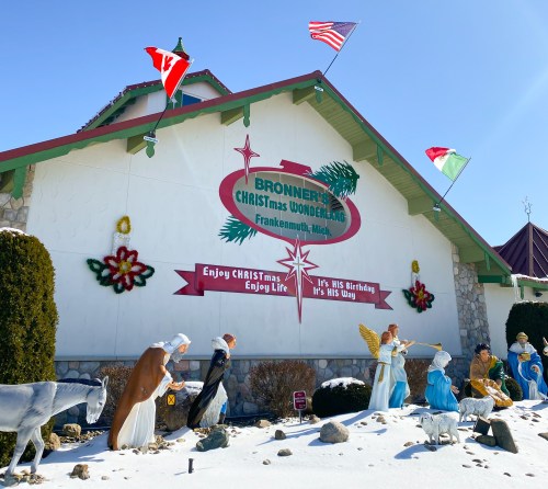 Exterior of Bronner's Christmas Wonderland in Frankenmuth, MI, featuring festive decorations and a nativity scene.