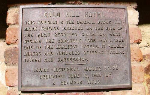Plaque detailing the history of the Gold Hill Hotel, noting its significance in the Comstock Lode and early mining era.
