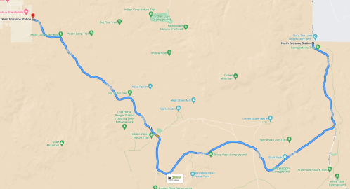Map showing a winding road with various points of interest and campgrounds along the route in a mountainous area.