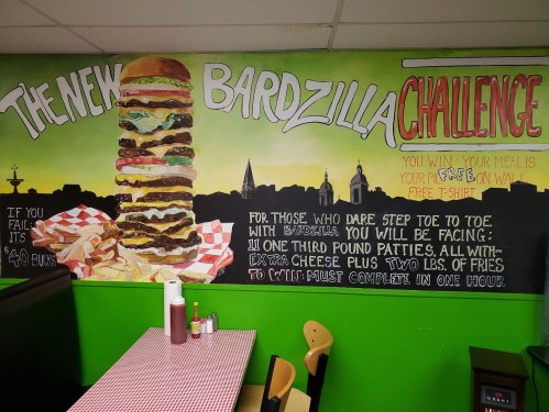 Mural advertising the Bardzilla Challenge: a massive burger and fries challenge with a free shirt for participants.