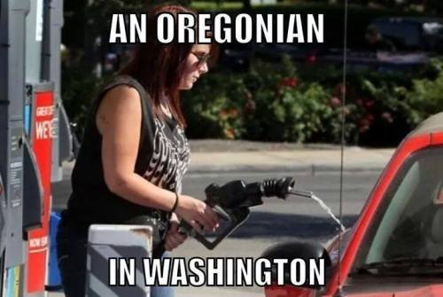 A person fills a car with gas at a station, humorously labeled "An Oregonian in Washington."