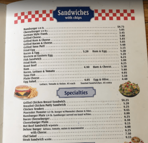 Menu featuring sandwiches and specialties with prices, including options like hamburgers, tuna melt, and chicken tenders.