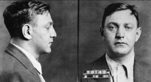 Black and white mugshot of a man, shown in profile and front view, with a number tag labeled "50149."