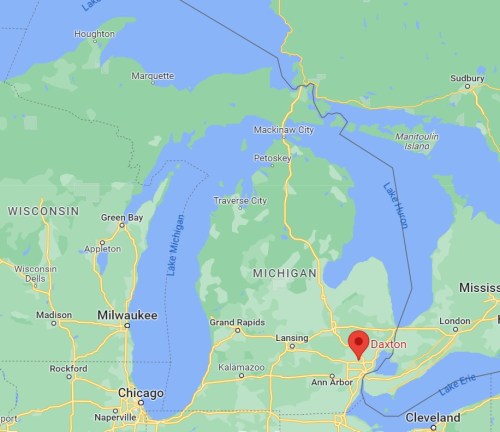 Map showing the location of Daxton, Michigan, near Lake Huron, with surrounding cities and geographical features.