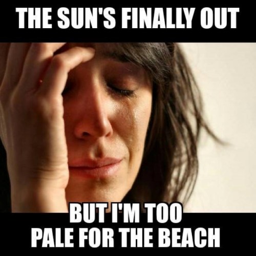 A woman with a distressed expression, holding her forehead, with text about feeling too pale for the beach.